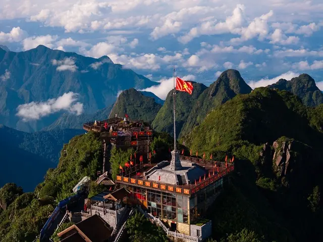Fansipan summit amid an autumn sea of clouds, a scenic setting for new beginnings during Diwali.